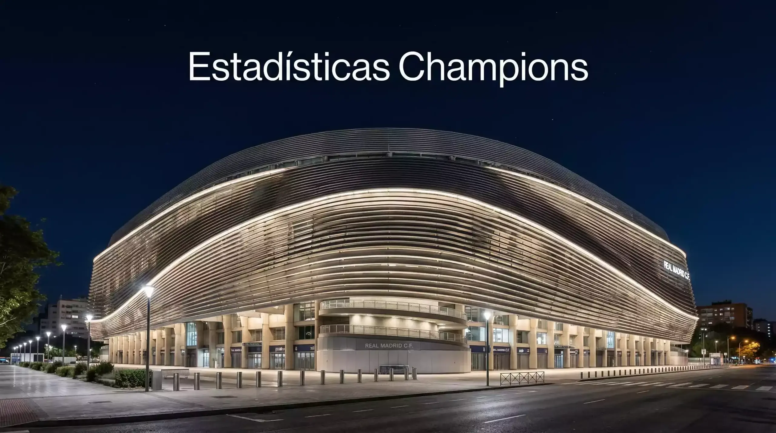 Estadio Santiago Bernabéu iluminado durante una noche de Champions League con el césped preparado